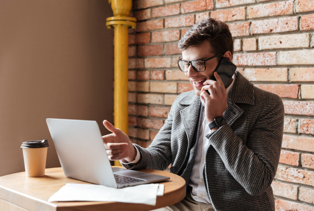 Side view of happy business man in eyeglasses